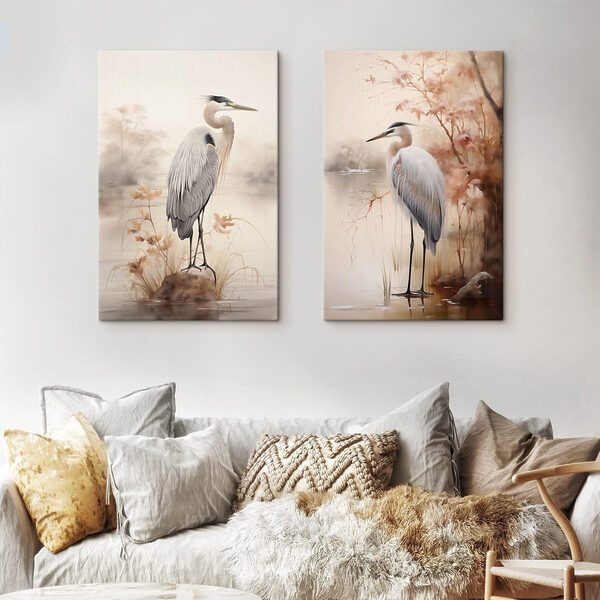 Two birds standing on a rock in water