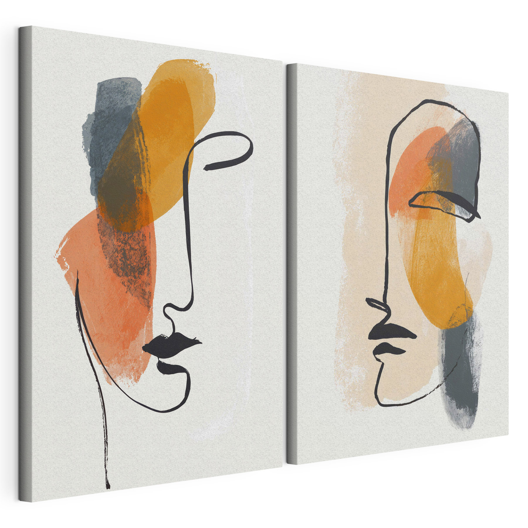Two faces drawn on paper